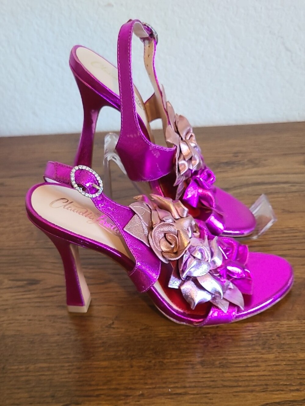 Claudia Lisotta "Tabitha" metallic pink sandals featuring floral appliqués